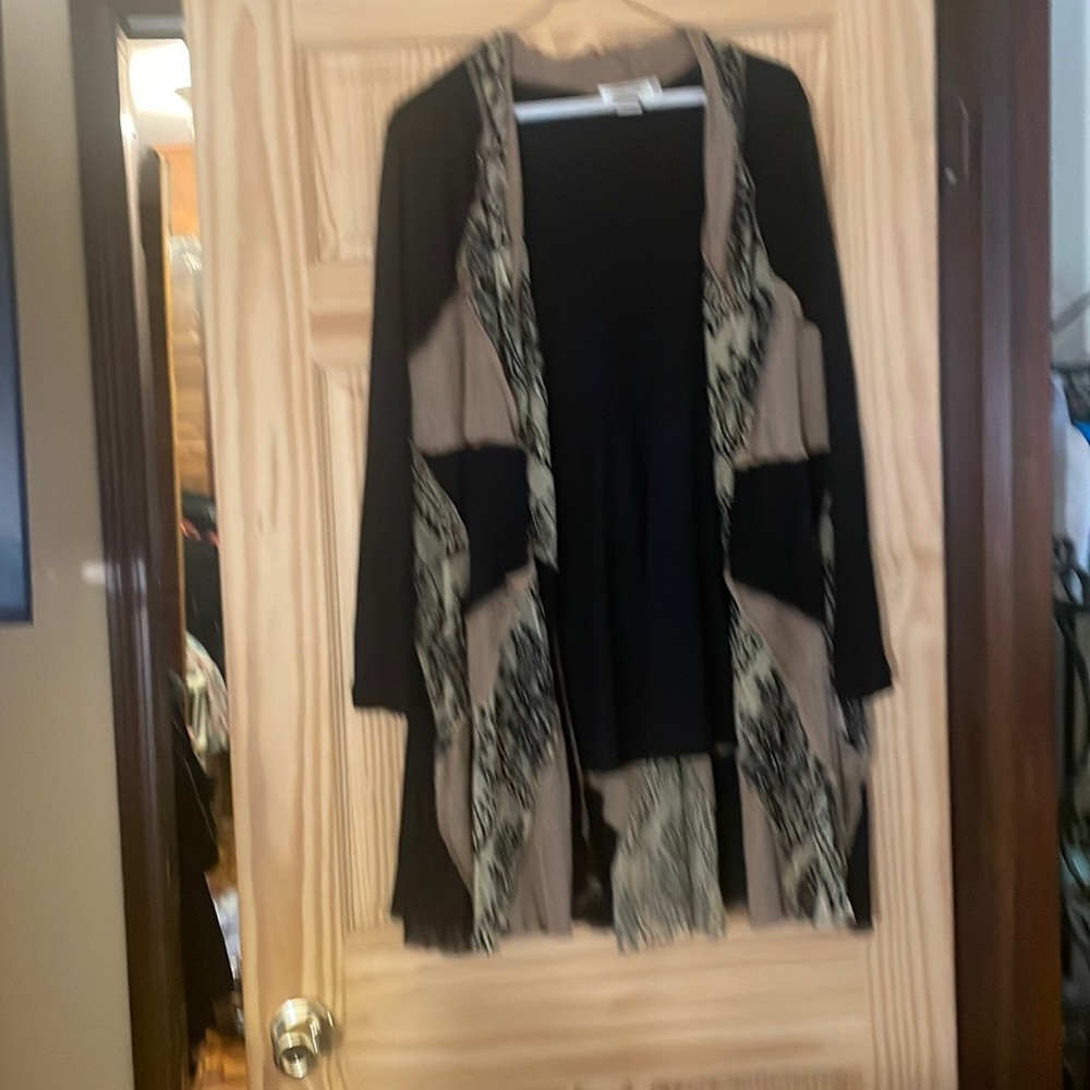 A knee length sweater light weight